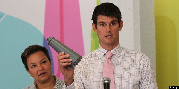 SAN FRANCISCO, CA - SEPTEMBER 15: Environmetal Protection Agency (EPA) Administrator Lisa Jackson (L) looks on as Method co-founder Adam Lowry (R) shows a container made from recycled plastic trash found in the Pacific Ocean during a press conference at the Method home care company on September 15, 2011 in San Francisco, California. Jackson visited the Method home care headquarters where she discussed jobs and sustainable business practices. (Photo by Justin Sullivan/Getty Images)