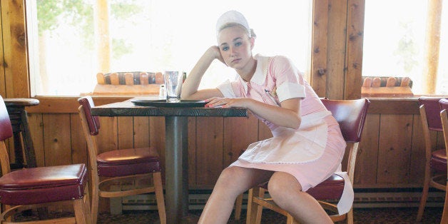 Waitress resting after work shift