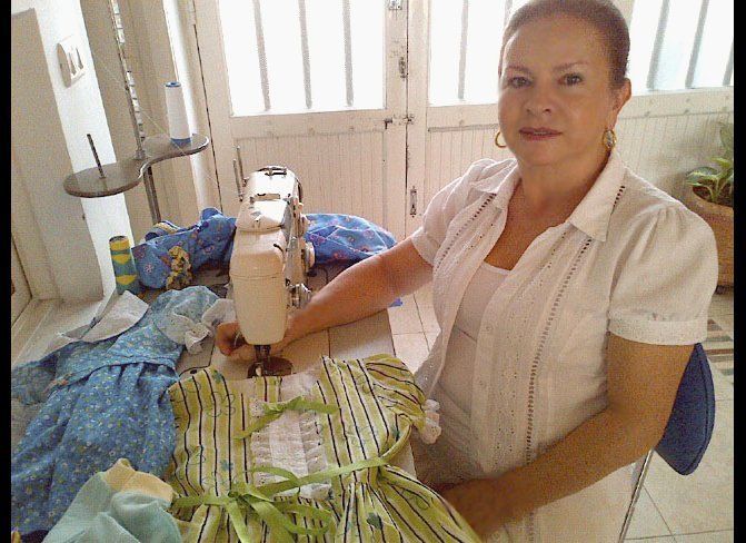 Once a #1 - NYC Gimbles Pattern Maker, Marina Garcia, now finds joy in her spare time making clothing from scrap material which she donates to the local children in need, in her region of Colombia .