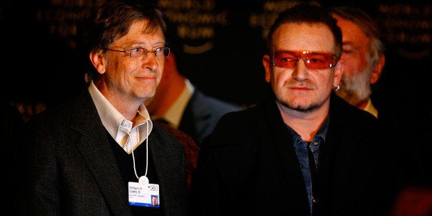 DAVOS, SWITZERLAND - JANUARY 25: Bill Gates and Bono, attend a press conference during the third day of the World Economic Forum January 25, 2008 in Davos,Switzerland.Some of the World's top business people, heads of state and representatives of NGOs will meet at the forum until Sunday. (Photo by Jeff J Mitchell/Getty Images)