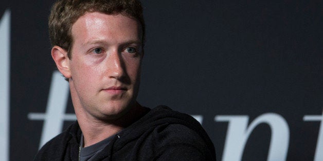 Mark Zuckerberg, founder and chief executive officer of Facebook Inc., listens to an audience member's question during an interview at the Newseum in Washington, D.C., U.S., on Wednesday, Sept. 18, 2013. Zuckerberg said helping 11 million undocumented U.S. residents is the most important aspect of immigration issues he's exploring with congressional leaders during a Washington visit. Photographer: Andrew Harrer/Bloomberg via Getty Images 