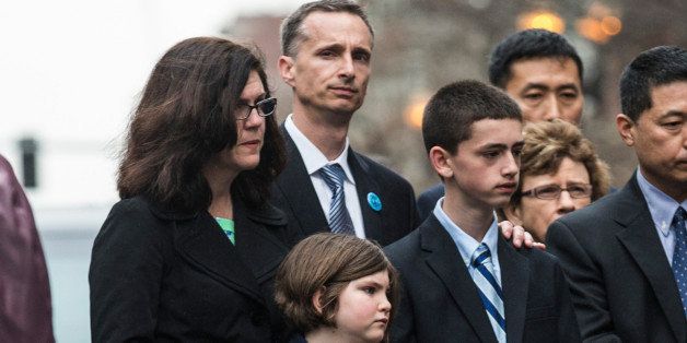 BOSTON, MA - APRIL 15: (L-R) Denise Richard, Bill Richard, Jane Richard and Henry Richard, the family of Martin Richard, an eight-year-old boy killed from a bomb at the Boston marathon, attend a wreath laying ceremony on the one year anniversary of the 2013 Boston Marathon Bombing, on April 15, 2014 in Boston, Massachusetts. Last year, two pressure cooker bombs killed three and injured an estimated 264 others during the Boston marathon, on April 15, 2013. (Photo by Andrew Burton/Getty Images)
