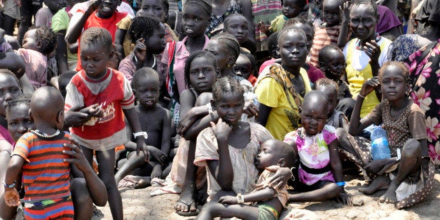 GAMBELA, ETHIOPIA - APRIL 1: Refugees fled to refugee camp in Ethiopia due to the clashes held in South Sudan, try to live under difficult conditions in Gambela, Ethiopia on April 1, 2014. Refugees up to 90 percent are women and children, suffer poverty, severe drought and an inability to treat medical emergencies. (Photo by Minasse Wondimu/Anadolu Agency/Getty Images)