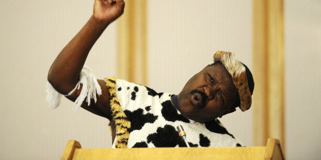 Zimbabwean poet Albert Nyathi performs during the closing ceremony of the 30th SADC (Southern African Development Community) summit on August 17, 2010 in Windhoek. Southern African leaders meet Monday and Tuesday in Namibia's capital to discuss Zimbabwe's strained unity government and its refusal to adhere to rulings by a regional tribunal. AFP PHOTO / STEPHANE DE SAKUTIN (Photo credit should read STEPHANE DE SAKUTIN/AFP/Getty Images)