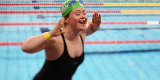 ATHENS, GREECE - JULY 01: (EDITORS NOTE: This Image was created with a variable planed lens) Ciara Trait of Ireland is pictured after winning the 25 meters backstroke run during the Athens 2011 Special Olympics World Summer Games on July 1, 2011 in Athens, Greece. (Photo by Vladimir Rys/Getty Images)