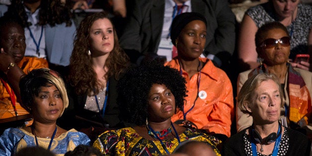 LONDON, ENGLAND - JULY 22: Delegates listen to the speeches at the 'Girl Summit 2014' in Walworth Academy on July 22, 2014 in London, England. At the one-day summit the government has announced that parents will face prosecution if they fail to prevent their daughters suffering female genital mutilation (FGM). (Photo by Oli Scarff/Getty Images)