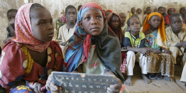 School children in their classroom in Ecole Mani, Chad, 120 km (75 miles) south of the capital, N'djamena, Tuesday, Feb. 21, 2006. Girls account for 60% of the 40 million children in Africa who do not attend school because of economic hardship or other adverse circumstances. As announced by President Bush, the Ambassadors Girls' Scholarship Program (AGSP) will provide 550,000 scholarships to school children, mostly girls, in sub-Saharan Africa. The AGSP includes mentoring programs for the children, which contribute to the social and educational development of students and communities. Examples of recipients are girls from economically poor households, those who are handicapped, orphaned or adversely affected by HIV/AIDS. AGSP is funded by the United States Agency for International Development (USAID). (AP Photo/Sayyid Azim)