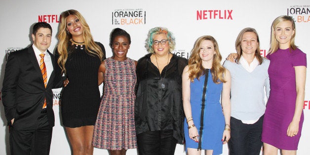 LOS ANGELES, CA - AUGUST 04: (L-R) Actors Jason Biggs, Laverne Cox, Uzo Aduba, Jenji Kohan, Natasha Lyonne, Netflix VP of Original Content Cindy Holland and actress Taylor Schilling arrive at the Los Angeles Screening of 'Orange Is The New Black' held at DGA Theater on August 4, 2014 in Los Angeles, California. (Photo by Michael Tran/FilmMagic)