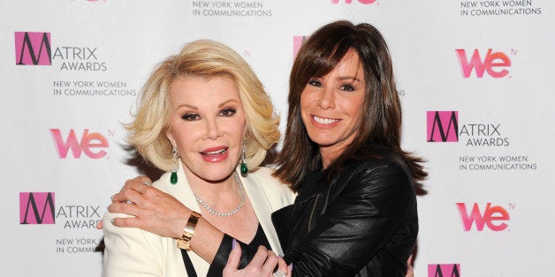 FILE - In this April 22, 2013 file photo, Television personalities Joan Rivers, left, and daughter Melissa Rivers attend the 2013 Matrix New York Women in Communications Awards at the Waldorf-Astoria Hotel, in New York. Attorneys for two women held in a Cleveland home and abused for a decade say Joan Rivers should apologize for comparing living in her daughter's guest room with the captivity they experienced. Rivers and her daughter were discussing their reality show Tuesday, April 22, 2014, on NBC's &quot;Today&quot; show when she complained about her living arrangements, saying, &quot;Those women in the basement in Cleveland had more space.&quot; (Photo by Evan Agostini/Invision/AP, file)