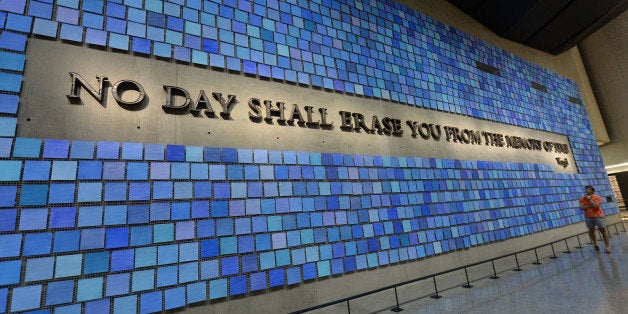 NEW YORK, NY - MAY 25: People visit the National 9/11 Memorial Museum in New York, United States on May 25, 2014. The National 9/11 Memorial Museum was opened to the public for the first time on May 21, 2014 and telling the story of 9/11 through multimedia displays, archives, narratives and a collection of monumental and authentic artifacts. (Photo by Cem Ozdel/Anadolu Agency/Getty Images)