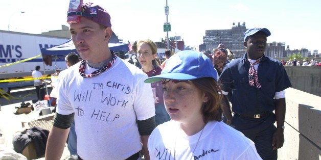 People volunteer to help on Sept. 15, 2001 after the September 11 terrorist attacks on the World Trade Center in New York City.(AP Photo/Robert F. Bukaty)