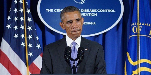US President Barack Obama makes a statement following meetings at the Centers for Disease Control and Prevention on September 16, 2014 in Atlanta, Georgia. Obama on Tuesday called on the world to 'act fast' to stop West Africa's Ebola epidemic before 'hundreds of thousands' are infected. Obama urged a global expanded effort to fight the deadly disease, as he unveiled a major new US initiative which will see 3,000 military personnel posted to West Africa to combat the health crisis.AFP PHOTO/Mandel NGAN (Photo credit should read MANDEL NGAN/AFP/Getty Images)