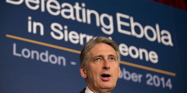 LONDON, ENGLAND - OCTOBER 2: British Foreign Secretary Philip Hammond speaks at the 'Defeating Ebola: Sierra Leone' conference at Lancaster House on October 2, 2014 in London, England. Britain hosted an international conference today to help organise the fight against Ebola in its former colony Sierra Leone, as a charity warned that five people were becoming infected every hour in the West African nation. (Photo by Matt Dunham - WPA Pool/Getty Images)