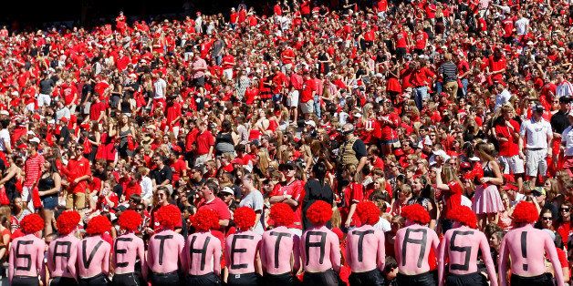 ATHENS, GA - OCTOBER 12: Georgia Bulldogs fans supper Breast Cancer Awareness Month with the slogan 'Save The Tatas!' on their backs during the game against the Missouri Tigers at Sanford Stadium on October 12, 2013 in Athens, Georgia. (Photo by Kevin C. Cox/Getty Images)