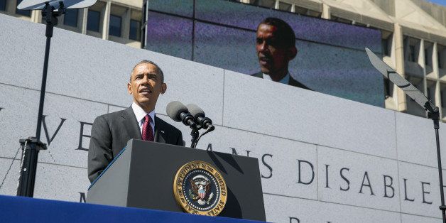 WASHINGTON, DC - OCTOBER 5: U.S. President Barack Obama speaks during a dedication ceremony for the American Veterans Disabled for Life Memorial on October 5, 2014 in Washington, DC. The memorial is dedicated to U.S. veterans severely injured in war. (Photo by Kristoffer Tripplaar-Pool/Getty Images)