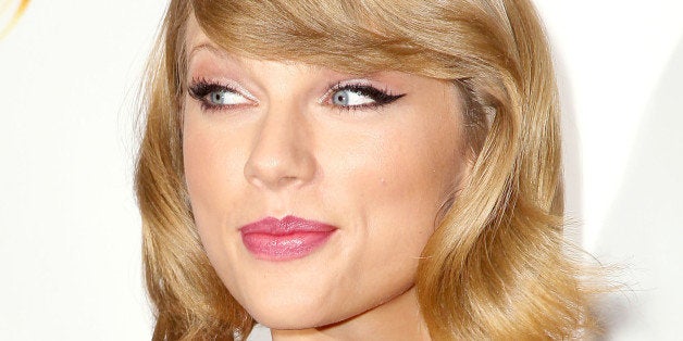 In this image released by Starpix, Taylor Swift attends the Z100's Jingle Ball 2014 at Madison Square Garden, Friday, Dec. 12, 2014 in New York. (AP Photo/Starpix, Aurora Rose)