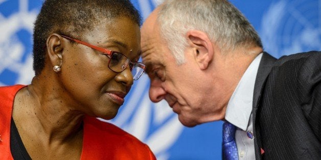 United Nations (UN) Under-Secretary-General for Humanitarian Affairs and Emergency Relief Coordinator, Valerie Amos (L) speaks with UN system senior Coordinator for Ebola, David Nabarro during a press conference on global aid pledged to fight the Ebola outbreak in west Africa on September 16, 2014 at UN offices in Geneva. UN says $1.0 billion is needed to fight Ebola. AFP PHOTO / FABRICE COFFRINI (Photo credit should read FABRICE COFFRINI/AFP/Getty Images)