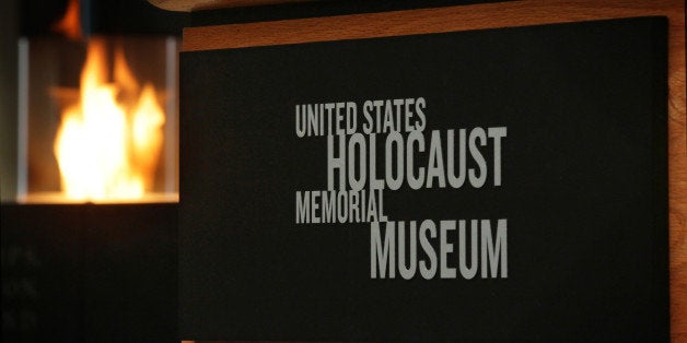 WASHINGTON, DC - JANUARY 27: An eternal flame is lit in the Hall of Remembrance during an International Holocaust Remembranc
