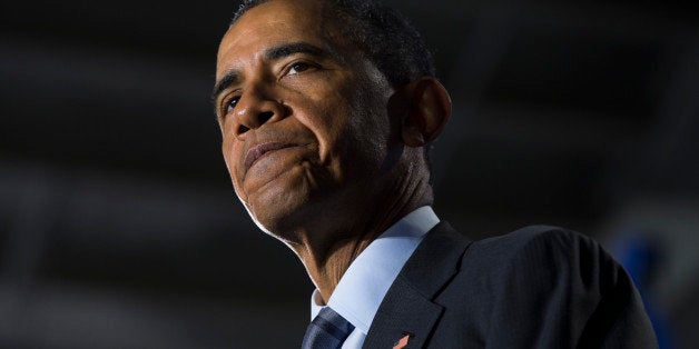 President Barack Obama pauses as he delivers remarks at the Department of Homeland Security on his FY2016 budget proposal, on Monday, Feb. 2, 2015, in Washington. Obama warned congressional Republicans Monday that he won't accept a spending plan that boosts national security at the expense of domestic programs for the middle class. (AP Photo/Evan Vucci)