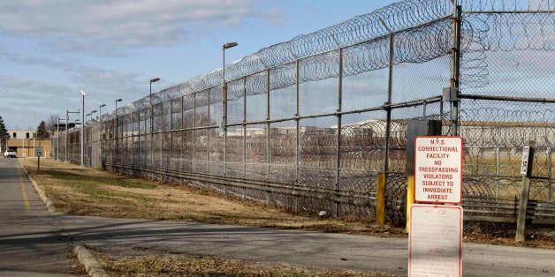 The entrance to the now-closed Arthur Kill Correctional Facility is shown on Staten Island in New York, Tuesday, Jan. 3, 2012. The correctional center is the seventh prison, camp, or work release facility shuttered in 2011 as New York transferred about 2,600 inmates and 1,400 staff to its 60 remaining penal units in an effort to save millions of dollars and remove excess capacity. (AP Photo/Kathy Willens)