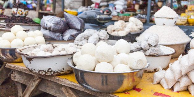 A market stall selling Fufu, rice, beans and Cassave powder.