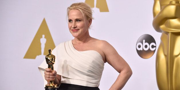 Patricia Arquette poses in the press room with the award for best actress in a supporting role for âBoyhoodâ at the Oscars on Sunday, Feb. 22, 2015, at the Dolby Theatre in Los Angeles. (Photo by Jordan Strauss/Invision/AP)