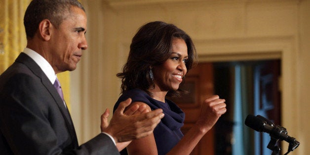 WASHINGTON, DC - MARCH 03: U.S. President Barack Obama (L) and first lady Michelle Obama announce a new government-wide coordinated strategy to help millions of girls around the world attend and stay school called 'Let Girls Learn' in the East Room of the White House March 3, 2015 in Washington, DC. Saying that she will focus on this program beyond her time in the White House, Michelle Obama will soon travel to Japan and Cambodia to promoted the new initiative. (Photo by Chip Somodevilla/Getty Images)