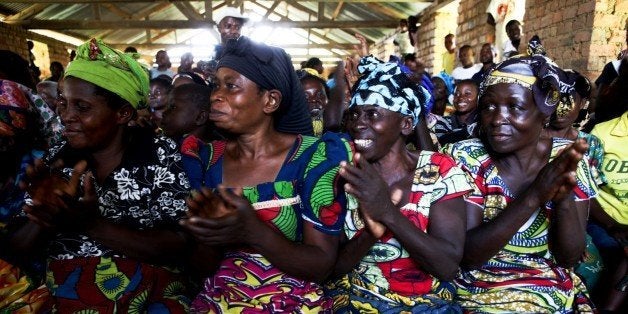 Picture taken on October 2, 2010 shows women of the village of Kampala attending a meeting with Margot Wallström , the Spec