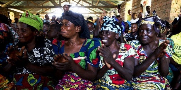 Picture taken on October 2, 2010 shows women of the village of Kampala attending a meeting with Margot WallstrÃ¶m , the Special Representative of the Secretary General for Sexual Violence and LeÃ¯la Zerougui (both unseen), the Special Representative of the Secretary General in DRC in eastern Democratic Republic of Congo. The village of Kampala is situated in the area of Walikala, where more than 300 women were raped in August by FDLR forces and MaÃ¯ MaÃ¯ militians. The Democratic Republic of Congo appealed on October 2 for help for its justice system to be able to tackle crimes listed in a UN report on massacres committed during its 1993-2003 war. AFP PHOTO / GWENN DUBOURTHOUMIEU (Photo credit should read Gwenn Dubourthoumieu/AFP/Getty Images)