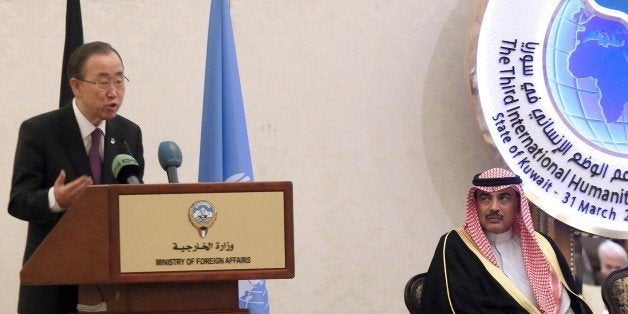 Kuwaiti Foreign Minister Sheikh Sabah al-Khaled al-Sabah (R) looks on as UN-Secretary General Ban Ki-moon speaks during the Third International Humanitarian Pledging Conference for Syria on March 30, 2015 in Kuwait City. AFP PHOTO / STR (Photo credit should read STR/AFP/Getty Images)