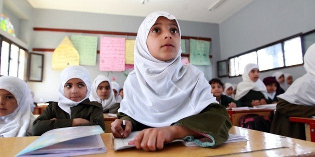 Yemeni schoolgirls attend a class on February 26, 2015 in the capital Sanaa. Yemen, long on the front line in the fight against Al-Qaeda, has been wracked by violence since the ouster of longtime autocrat Ali Abdullah Saleh in February 2012 following a year-long popular uprising. AFP PHOTO / MOHAMMED HUWAIS (Photo credit should read MOHAMMED HUWAIS/AFP/Getty Images)