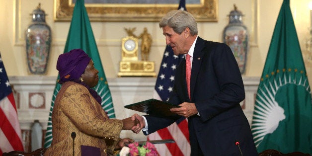 WASHINGTON, DC - APRIL 13: U.S. Secretary of State John Kerry (R) and African Union Commission Chairperson Nkosazana Dlamini Zuma (L) shake hands during a signing ceremony of a Memorandum of Cooperation to Support the African Centres for Disease Control and Prevention during the opening of the African Union Commission High Level Dialogue April 13, 2015 at the State Department in Washington, DC. Through the signing of the memorandum, the U.S. CDC will provide technical expertise to the African Union to support establishing an African Surveillance and Response Unit and an Emergency Operations Center within the African CDC. (Photo by Alex Wong/Getty Images)