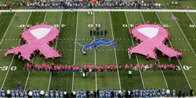 Pink ribbons are displayed for Breast Cancer Awareness before an NFL football game between the Detroit Lions and the Buffalo Bills, Sunday, Oct. 5, 2014, in Detroit. (AP Photo/Paul Sancya)