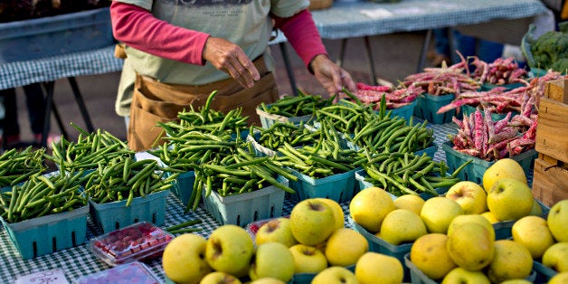 Apples and green beans for sale at the Farmers Market in Washington, Thursday, Oct. 11, 2012. (AP Photo/J. Scott Applewhite)