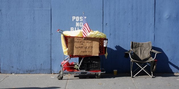 NEW YORK - NOVEMBER 11: A homeless person's grocery cart and chair is shown along Fifth Avenue during the annual Veterans Day parade November 11, 2006 in New York City. The parade, which has more than 20,000 participants, runs up Fifth Avenue from 23rd Street to 59th Street. (Photo by Michael Nagle/Getty Images)