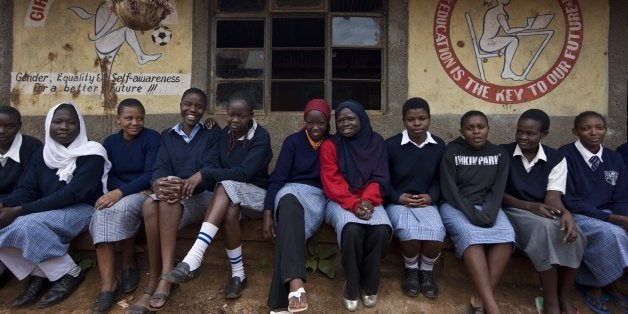 KIBERA SLUM, NAIROBI, KENYA - AUGUST 2008: Images of impoverished girls who are very vulnerable in their communities, on August 20, 2008 in Nairobi, Kenya. The Nike Foundation for Girls has made small stipends available to fund a community for girls in disadvantaged area based on the fact that girls prove to be a better investment in poor communities than boys do. Many of these girls have now made friends, gained support and learnt job skills via these community facilities for girls. Nike Foundation believes that supporting girls is the key to a better future for everyone. (Photo by Brent Stirton/Getty Images)