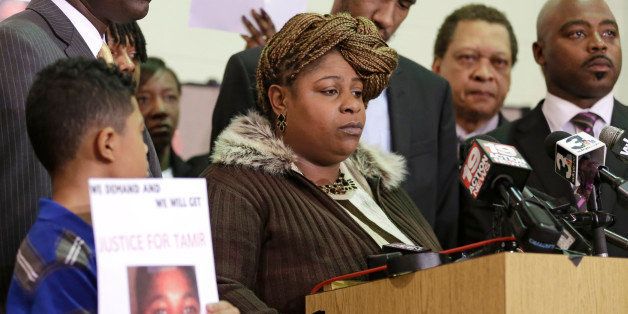 Samaria Rice, the mother of Tamir, a 12-year-old boy fatally shot by a Cleveland police officer, speaks during a news conference Monday, Dec. 8, 2014, in Cleveland. Surveillance video released by police shows Tamir Rice being shot within 2 seconds of a patrol car stopping within a few feet of him at a park on Nov. 22. (AP Photo/Tony Dejak)