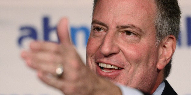 TO GO WITH AFP STORY BY MARIANO ANDRADENew York City mayoral candidate Bill De Blasio addresses a speech in front of members of the Association for a Better New York (ABNY) in New York, October 4, 2013. AFP PHOTO/Emmanuel Dunand (Photo credit should read EMMANUEL DUNAND/AFP/Getty Images)