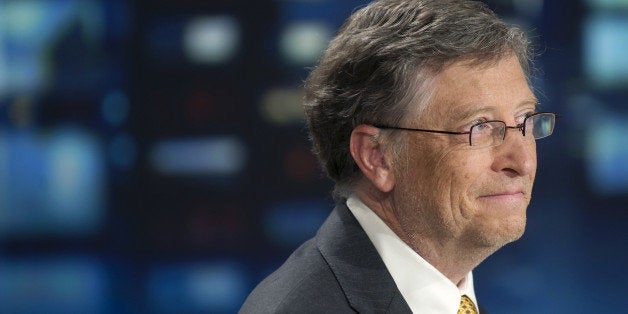 Microsoft founder and philanthropist Bill Gates smiles on the set of the TF1 TV channel in Paris on April 4, 2011, before an