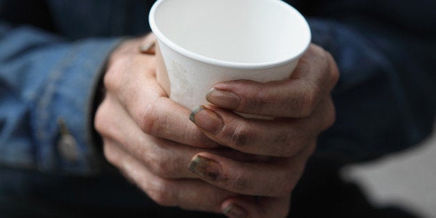 SAN FRANCISCO - SEPTEMBER 16: A homeless man holds a cup as he begs panhandles for spare change on September 16, 2010 in San Francisco, California. The U.S. poverty rate increased to a 14.3 percent in 2009, the highest level since 1994. (Photo by Justin Sullivan/Getty Images)