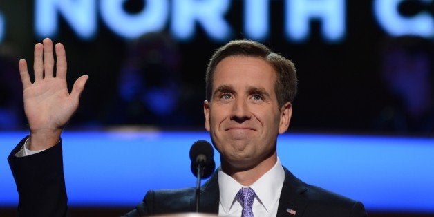 Attorney General of Delaware and Son of Vice President Joe Biden Beau Biden waves at the Time Warner Cable Arena in Charlotte, North Carolina, on September 6, 2012 on the final day of the Democratic National Convention (DNC). US President Barack Obama is expected to accept the nomination from the DNC to run for a second term as president. AFP PHOTO Robyn BECK (Photo credit should read ROBYN BECK/AFP/GettyImages)