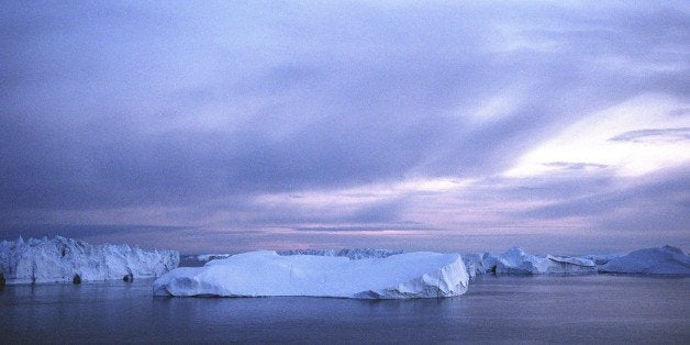 JACOBSHAVN BAY, GREENLAND - AUGUST 24: (ISRAEL OUT) Icebergs float in the Jacobshavn Bay on August 24, 2007 near the town of Ilulissat, Greenland. Scientists believe that Greenland, with its melting ice caps and disappearing glaciers, is an accurate thermometer of global warming. (Photo by Uriel Sinai/Getty Images)