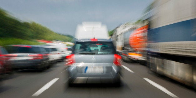 BERLIN, GERMANY - JULY 16: Symbolic picture illustrating accident risk though fast approaching of the end of a traffic jam on July 16, 2014, in Berlin, Germany. (Photo by Thomas Trutschel/Photothek via Getty Images)***Local Caption***