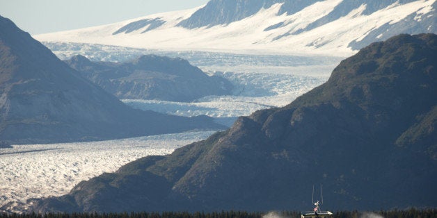 A boat carrying President Barack Obama makes its way to Bear Glacier, which has receded 1.8 miles in approximately 100 years