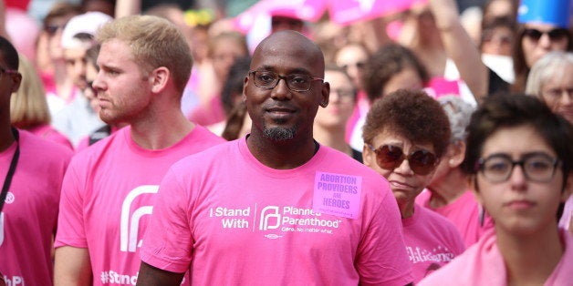 MANHATTAN, NEW YORK CITY, NEW YORK, UNITED STATES - 2015/09/29: Activists in pink shirts listen to speeches. Activists and directors of Planned Parenthood, NYC, gathered in Foley Square along NYC first lady Chirlane McCray and elected representatives to demonstrate support for the organization. (Photo by Andy Katz/Pacific Press/LightRocket via Getty Images)