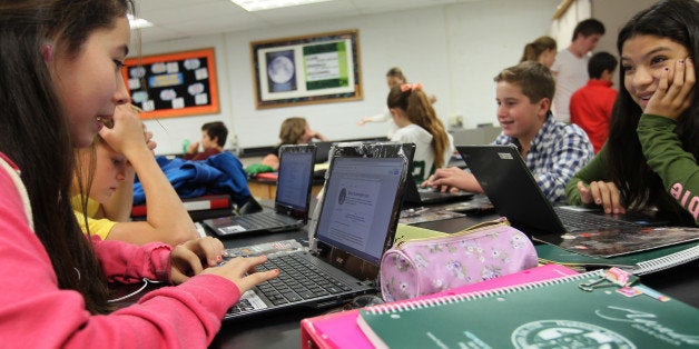 HOPKINTON, MA - SEPTEMBER 26: Students studying Earth Science at the Hopkinton Middle School on their Chromebooks. (Photo by Joanne Rathe/The Boston Globe via Getty Images)