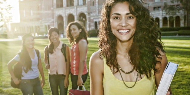 Student smiling on campus