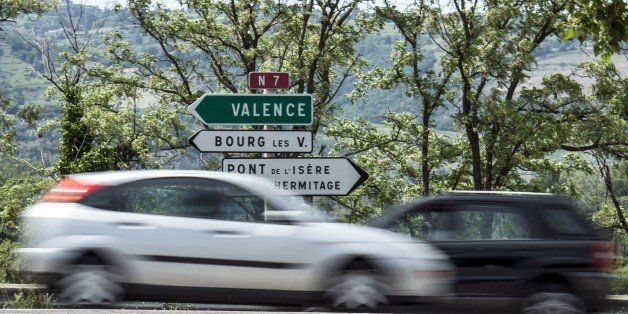 Cars run along one of the three road portions where the speed limit will be reduced to 80 km/H instead of the usual 90, on May D12, 2015 on the N7 national road between Gervans and Valence. AFP PHOTO / JEAN-PHILIPPE KSIAZEK (Photo credit should read JEAN-PHILIPPE KSIAZEK/AFP/Getty Images)