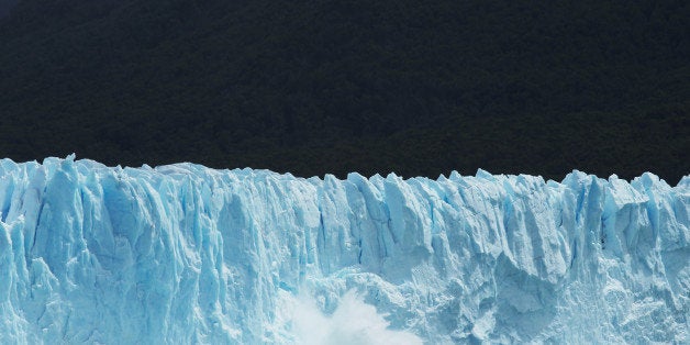 SANTA CRUZ PROVINCE, ARGENTINA - NOVEMBER 29: Ice calves from the Northern wall of the Perito Moreno glacier in Los Glaciares National Park, part of the Southern Patagonian Ice Field, on November 29, 2015 in Santa Cruz Province, Argentina. Certain areas of glacial ice take on a bluish hue due to light refraction. The Southern Patagonian Ice Field is the third largest ice field in the world. The majority of the almost 50 large glaciers in Los Glaciares National Park have been retreating during the past fifty years due to warming temperatures, according to the European Space Agency (ESA). The United States Geological Survey (USGS) reports that over 68 percent of the world's freshwater supplies are locked in ice caps and glaciers. The United Nations climate change conference begins November 30 in Paris. (Photo by Mario Tama/Getty Images)