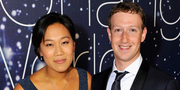 MOUNTAIN VIEW, CA - NOVEMBER 09: Breakthrough Prize Founders Priscilla Chan and Mark Zuckerberg (R) attend the Breakthrough Prize Awards Ceremony Hosted By Seth MacFarlane at NASA Ames Research Center on November 9, 2014 in Mountain View, California. (Photo by Steve Jennings/Getty Images for Breakthrough Prize)